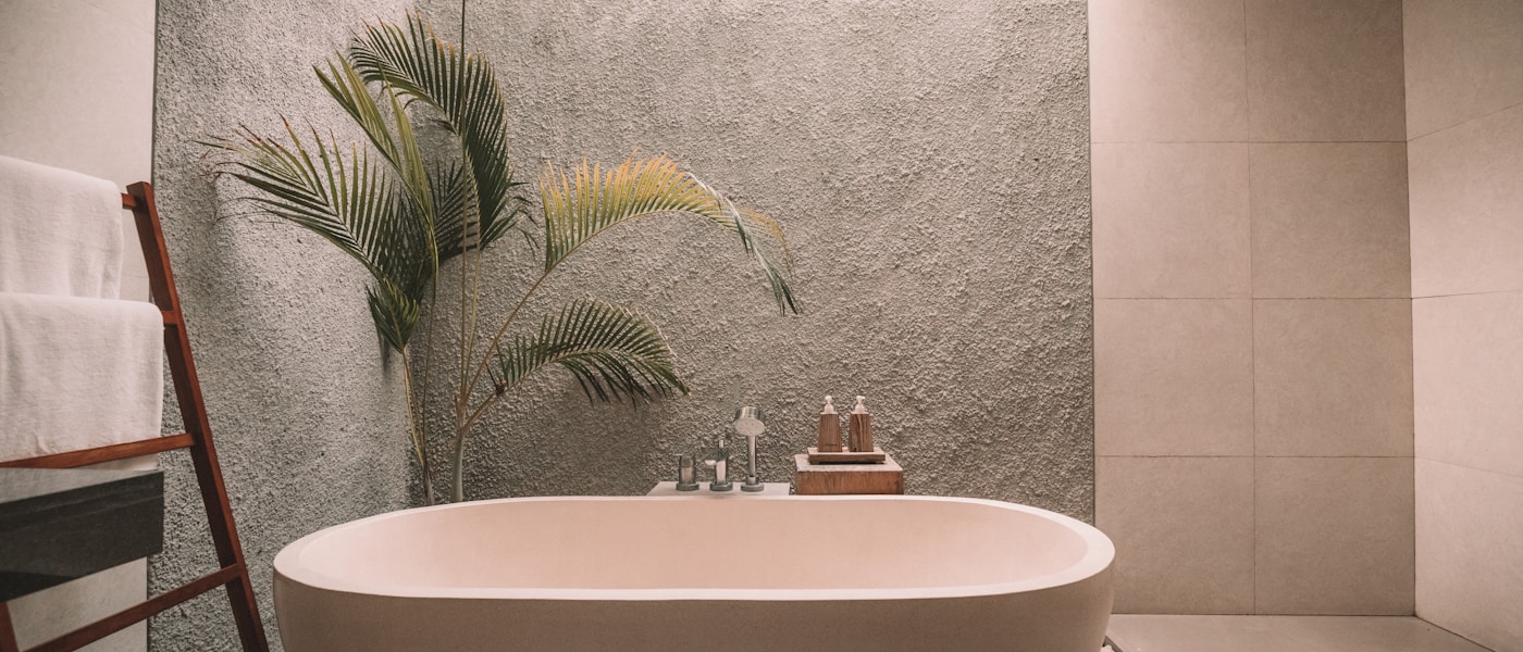 Silk-cotton tree roots weaving through ancient stone corridors at Ta Prohm temple